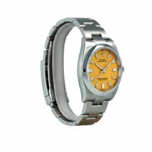 rolex-oyster-perpetual-yellow-dial-1244-1.jpg